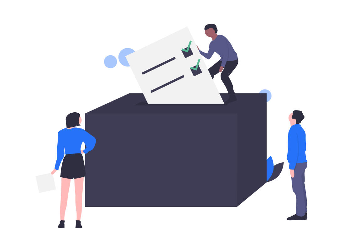 immagine indicante una scheda elettorale inserita nell'urna